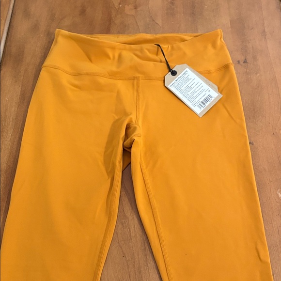 Prana NWT Chakara Mid Rise Mustard Yellow Leggings Size Medium - Picture 2 of 13